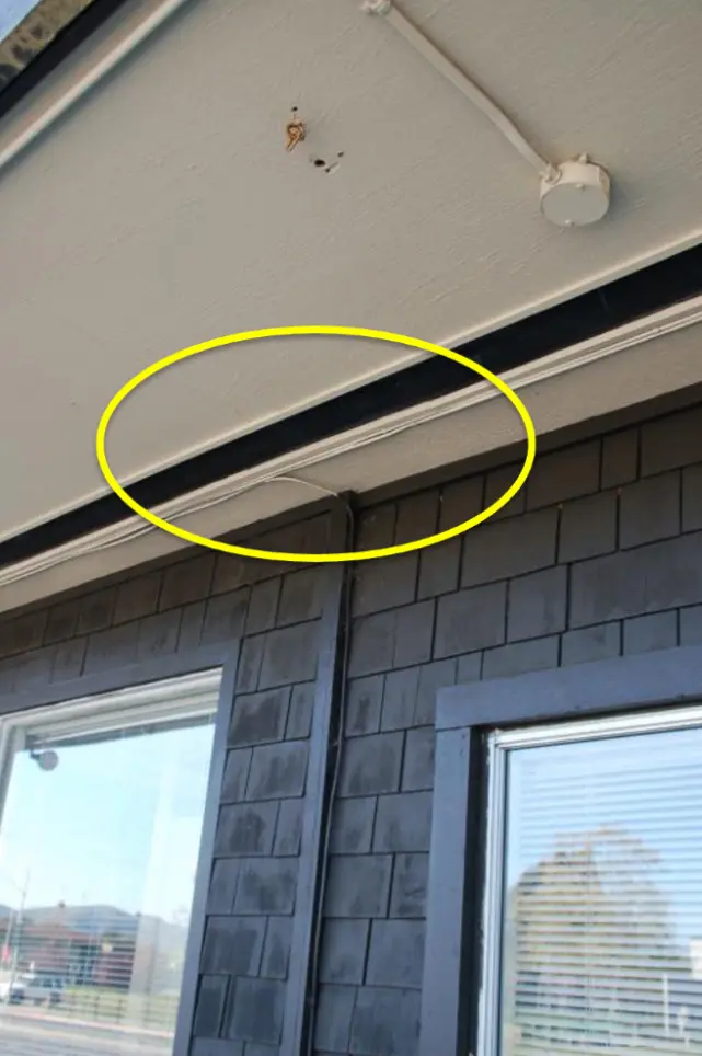 Soffited eave with vents installed.